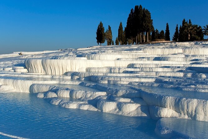 8 Day Turkey tour with flights with private option . Express Gold - Pamukkale pairs Roman ruins with white mineral terraces
