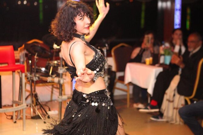 Bosphorus Dinner Cruise Tour With Turkish Night Show - Passing beneath the 15 July Martyrs Bridge