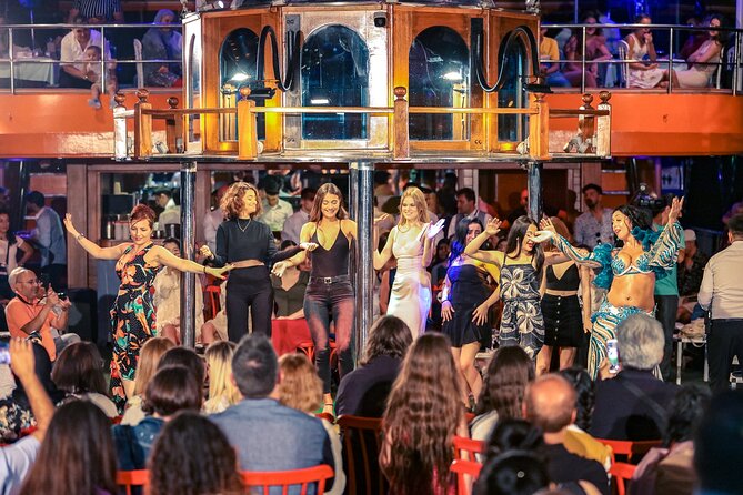 Bosphorus Dinner Cruise & Turkish Dance Shows with Private Table - Istanbul from the Bosphorus after dark