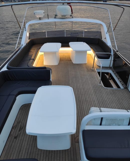 Bosphorus Sunset Yacht Cruise with Guide & Snacks - Ortaköy and Bebek as evening scenery