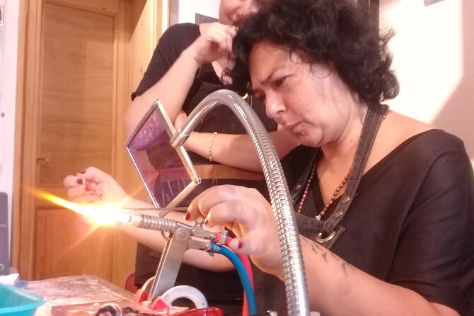 Glass Melting and Shaping with Flame with the Senior Glass Master - Working at the flame with safety gear and steady hands