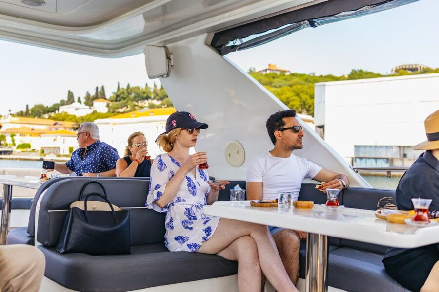 Istanbul: Bosphorus Yacht Cruise with Stopover on Asian Side - Under the bridges toward Bebek and Rumeli Fortress