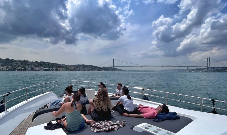 Istanbul: Dolmabahce Palace Tour and Bosphorus Yacht Cruise - Boarding the yacht for the Bosphorus