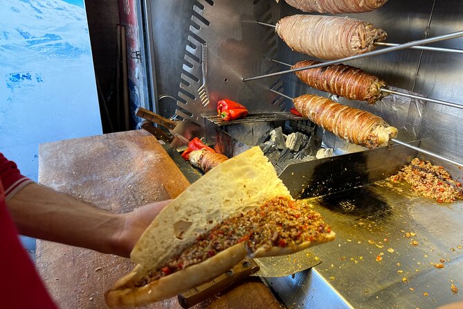 Istanbul Guided Street Food Tour Around European and Asian Sides - Returning to Europe and eating fish in Karaköy