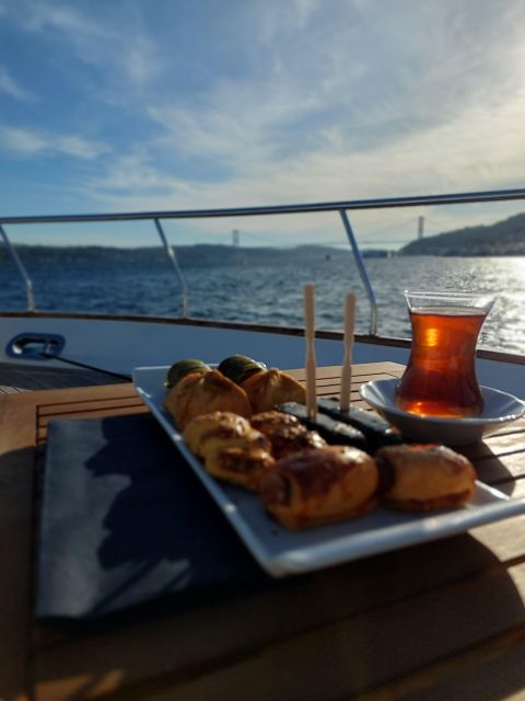 Istanbul: Sunset Yacht Cruise on the Bosphorus with Transfer - Pickup, boarding, and the first minutes on the water