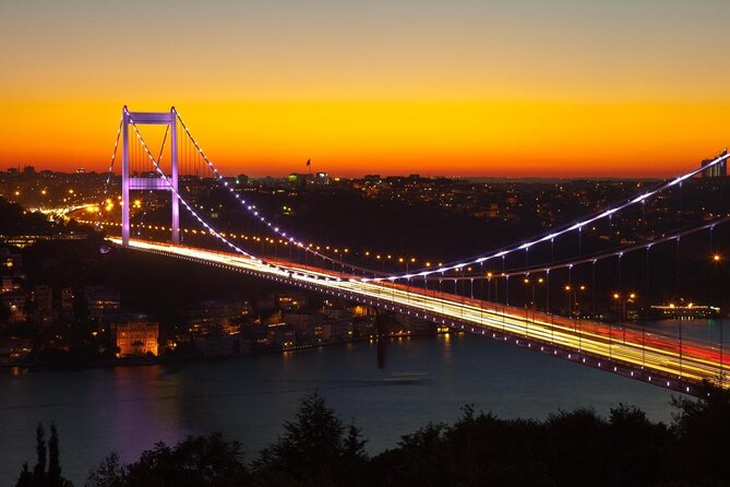 Istanbul Sunset Yacht Cruise on the Bosphorus with Transfers - Dolmabahçe Palace and Çırağan Palace from the water