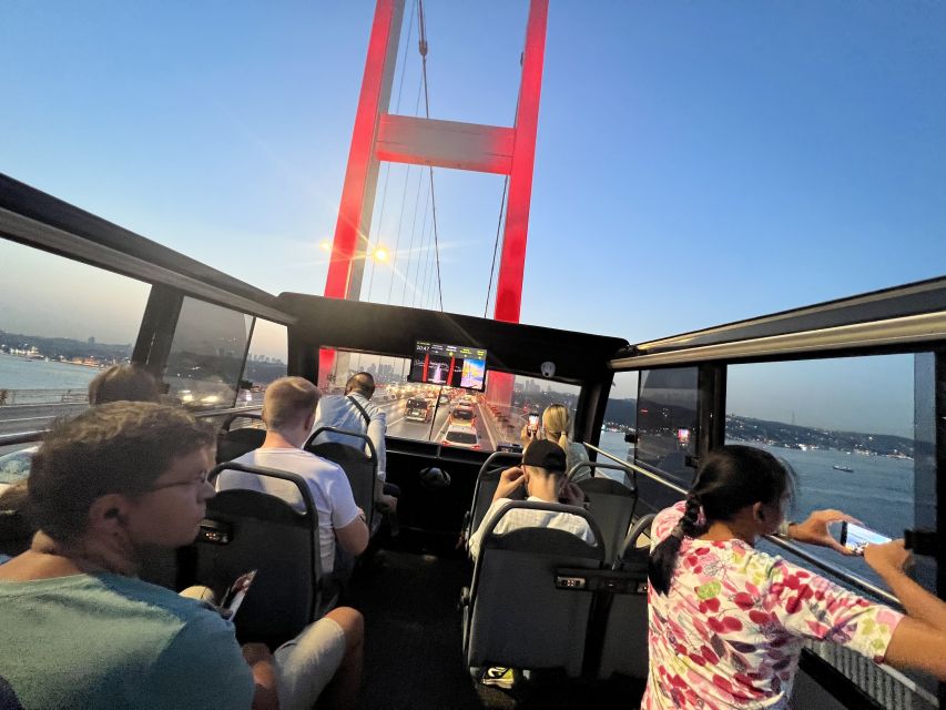 Istanbul: Two Continents Evening Bus Tour with Commentary - Besiktas and Taksim Square after dark